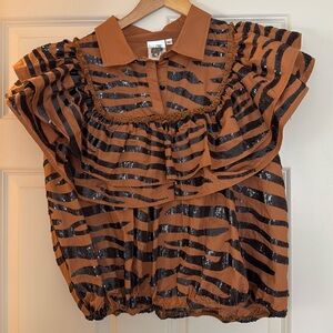 Queen of sparkles tiger print ruffle top